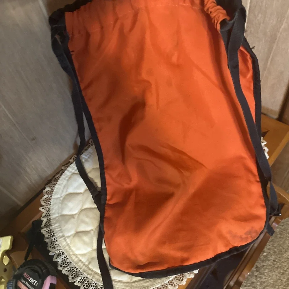 Nike Brasilia 9.5 Training Gym Sack featuring a vibrant‎ orange White Swoosh